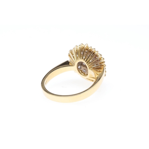 1070 - A DIAMOND CLUSTER RING. mounted with circular-cut diamonds, in 18ct yellow gold, 9.1 grams. Size T.