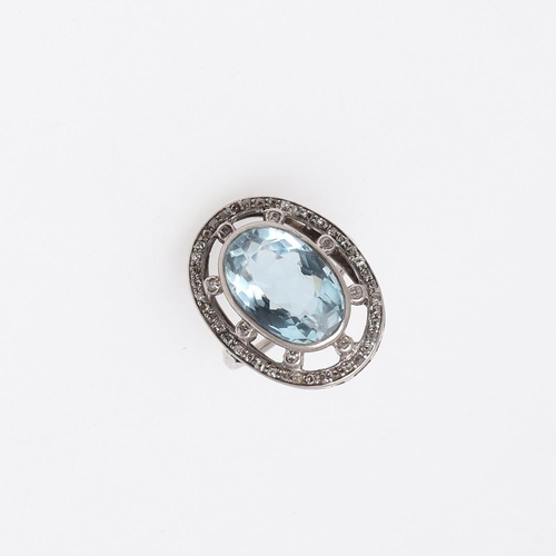 1077 - AN AQUAMARINE AND DIAMOND RING. the oval-shaped aquamarine is set within an openwork surround of cir... 