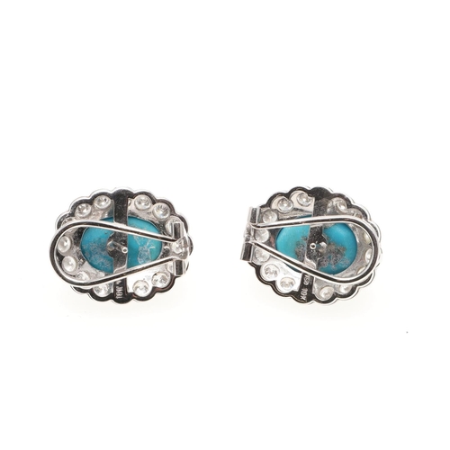 1118 - A PAIR OF DIAMOND & TURQUOISE CLUSTER EARRINGS. each earring set with an oval-shaped turquoise caboc... 