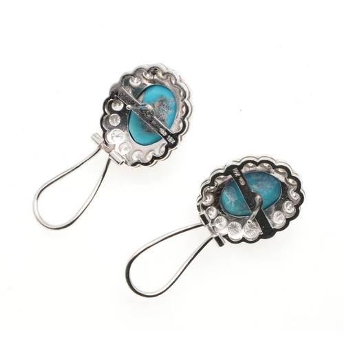 1118 - A PAIR OF DIAMOND & TURQUOISE CLUSTER EARRINGS. each earring set with an oval-shaped turquoise caboc... 