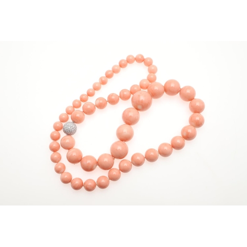 1120 - A GRADUATED NATURAL CORAL BEAD NECKLACE. the coral beads graduate from approximately 10.0 to 24.0mm ... 