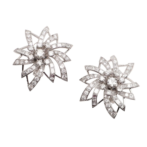 1123 - A PAIR OF DIAMOND EARRINGS BY MAUBOUSSIN. of foliate form, mounted with round brilliant-cut diamonds... 