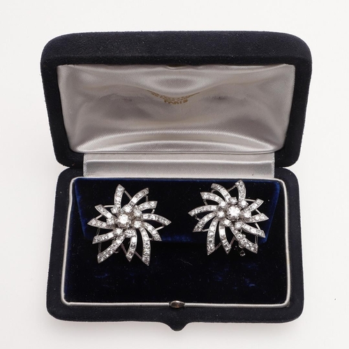 1123 - A PAIR OF DIAMOND EARRINGS BY MAUBOUSSIN. of foliate form, mounted with round brilliant-cut diamonds... 