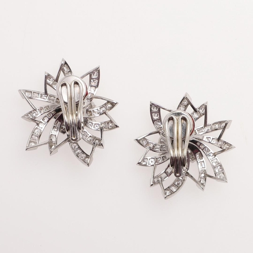 1123 - A PAIR OF DIAMOND EARRINGS BY MAUBOUSSIN. of foliate form, mounted with round brilliant-cut diamonds... 