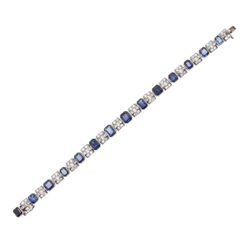 1126 - AN ART DECO SAPPHIRE AND DIAMOND BRACELET. mounted alternately with octagonal-shaped sapphires and m... 