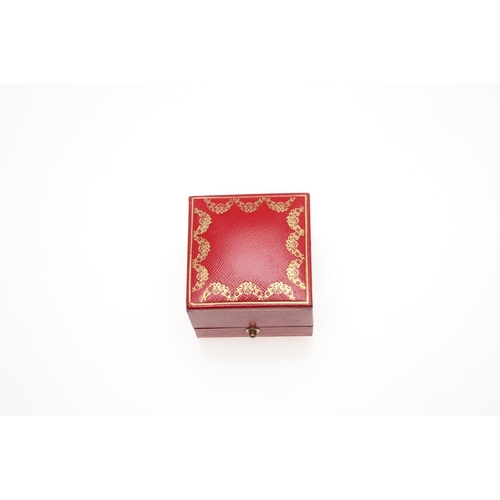 791 - A RED LEATHER RING BOX BY BY CARTIER. signed to the inside, 5.5cm square.