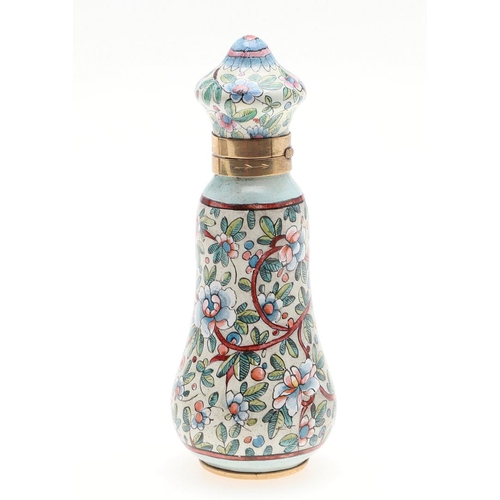 797 - AN ENAMEL AND GOLD SCENT BOTTLE. With foliate enamel decoration, 7.5cm high, 55.0 grams, in fitted c... 