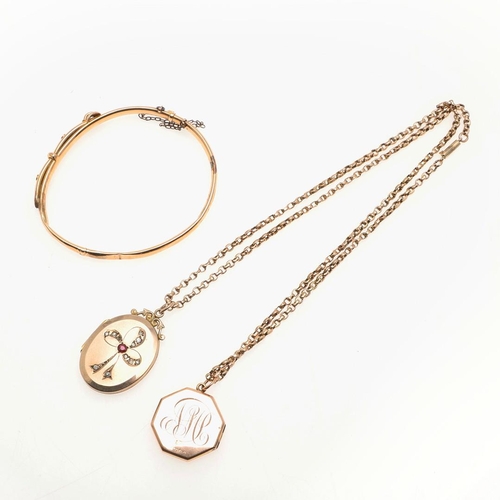 805 - A 9CT GOLD LOCKET PENDANT. of oval-shape mounted with paste stones, together with a gold octagonal-s... 