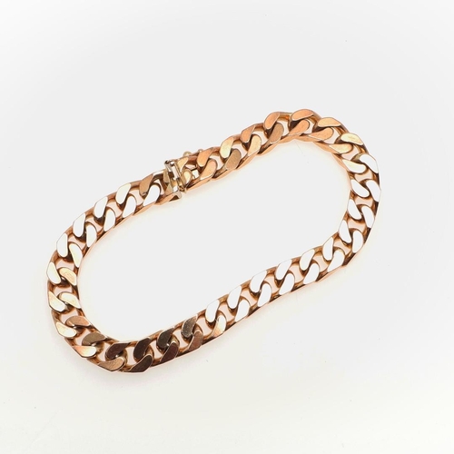 810 - A 9CT GOLD FLAT CURB LINK BRACELET. with concealed clasp, 20cm long, 32.3 grams.