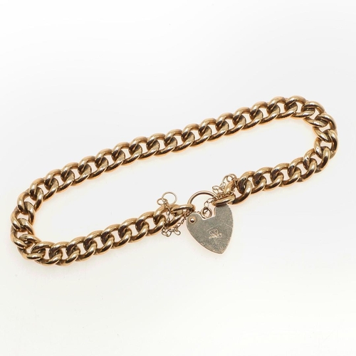 811 - A 9CT GOLD CURB LINK BRACELET. with padlock clasp, 19cm long, 26.3 grams.