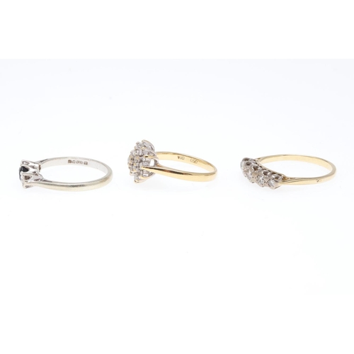 834 - A DIAMOND FIVE STONE RING. mounted with five graduated circular-cut diamonds, in yellow gold, 3.3 gr... 