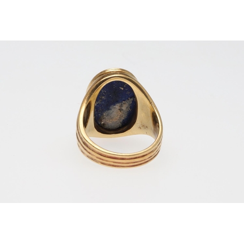 848 - A GENTLEMAN'S LAPIS LAZULI AND 18CT GOLD SIGNET RING. mounted with an oval-shaped section of lapis l... 