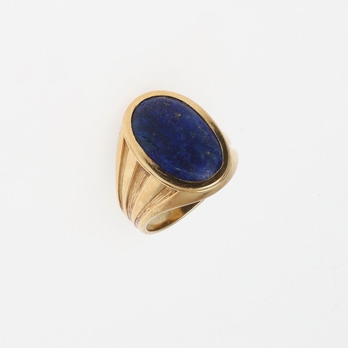 848 - A GENTLEMAN'S LAPIS LAZULI AND 18CT GOLD SIGNET RING. mounted with an oval-shaped section of lapis l... 