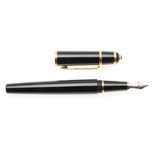 859 - A BLACK FOUNTAIN PEN BY CARTIER. with gold plated decoration, 18ct gold nip, in a red leather box by... 