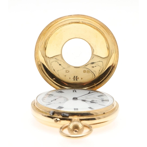 871 - AN 18CT GOLD HALF HUNTING CASED POCKET WATCH. the white enamel dial with Roman numerals and subsidia... 