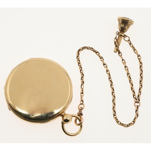 873 - AN 18CT GOLD OPEN FACED POCKET WATCH. the gold dial with engine turned decoration, Roman numerals an... 