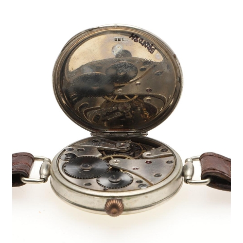 892 - A GENTLEMAN'S SILVER WRISTWATCH BY DENT. the signed circular dial with Roman numerals, on a brown le... 