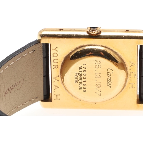 900 - AN 18CT GOLD TANK WRISTWATCH BY CARTIER. the signed white enamel dial with Roman numerals, cabochon ... 