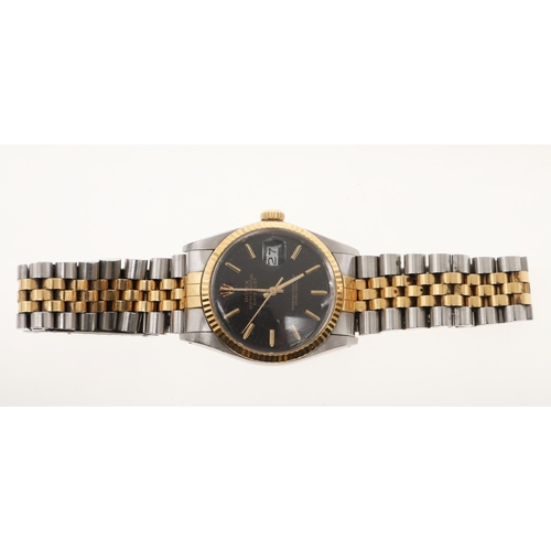 903 - A GENTLEMAN'S STAINLESS STEEL AND GOLD OYSTER PERPETUAL DATEJUST WRISTWATCH BY ROLEX. the signed bla... 