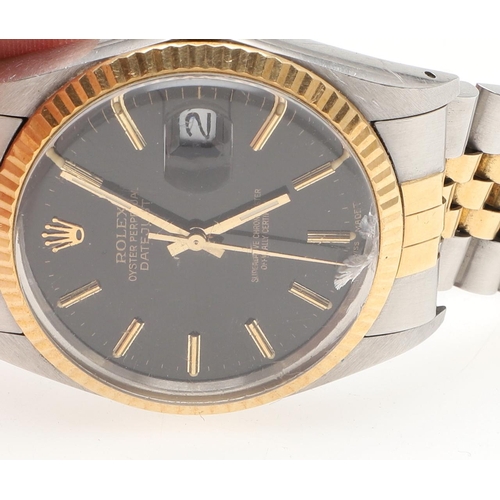 903 - A GENTLEMAN'S STAINLESS STEEL AND GOLD OYSTER PERPETUAL DATEJUST WRISTWATCH BY ROLEX. the signed bla... 