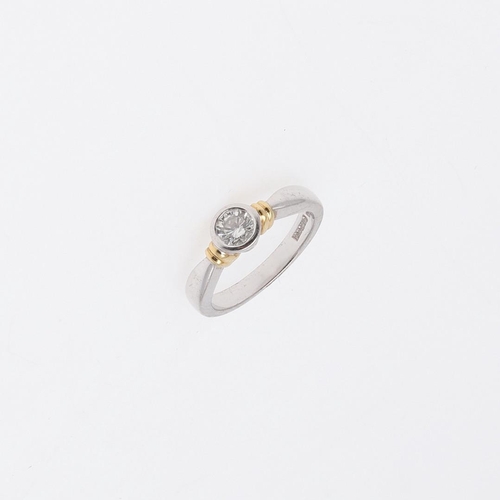 918 - A DIAMOND SOLITAIRE RING. mounted with a circular-cut diamond in rub-over setting, in 18ct gold, 4.2... 