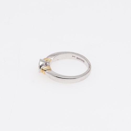 918 - A DIAMOND SOLITAIRE RING. mounted with a circular-cut diamond in rub-over setting, in 18ct gold, 4.2... 