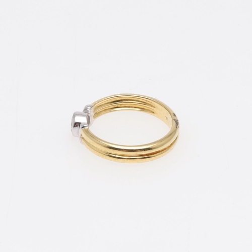 921 - A DIAMOND SOLITAIRE RING. mounted with a circular-cut diamond in rub-over setting, in 18ct gold, 5.1... 