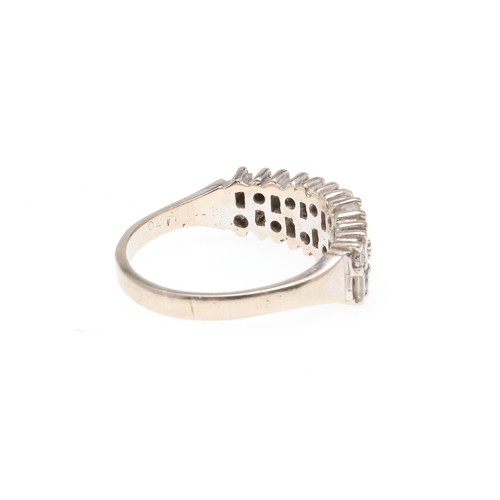 929 - A DIAMOND HALF HOOP RING. mounted with baguette-cut and circular-cut diamonds, in 18ct white gold, 5... 