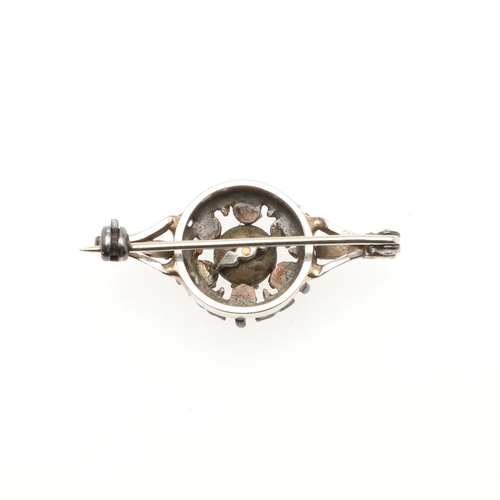 941 - A DIAMOND CLUSTER BROOCH. centred with a rose-cut diamond, within a surround of smaller rose-cut dia... 