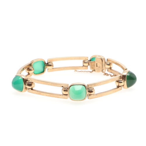 948 - A CHRYSOPRASE AND GOLD BRACELET. formed with domed chrysoprase cabochons and 9ct gold openwork recta... 