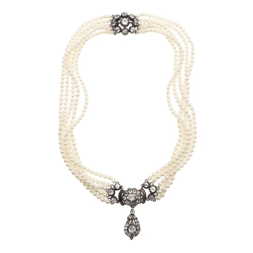 955 - A FIVE ROW CULTURED PEARL AND PASTE SET CHOKER. the cultured pearls measure approximately 3.5mm and ... 