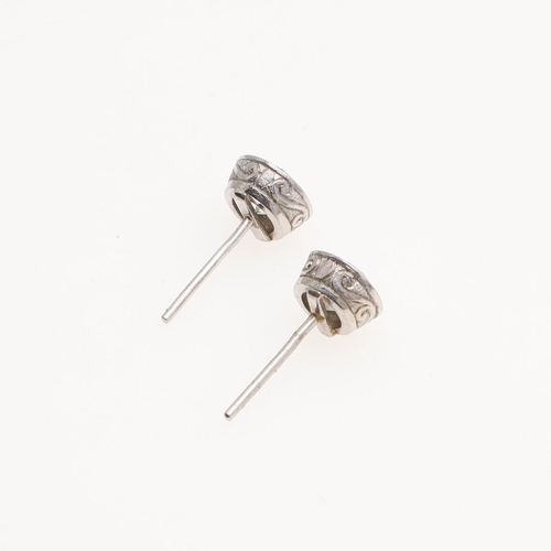 959 - A PAIR OF DIAMOND STUD EARRINGS. each earring set with brilliant-cut diamond weighing approximately ... 