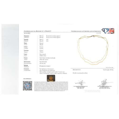 1121 - A DOUBLE ROW GRADUATED NATURAL PEARL NECKLACE. the pearls graduate from approximately 2.3 to 6.9mm a... 