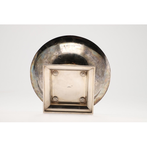122 - A MODERN SILVER FRUIT DISH ON STAND, BY THEO FENNELL. circular form, raised on a sloping square base... 