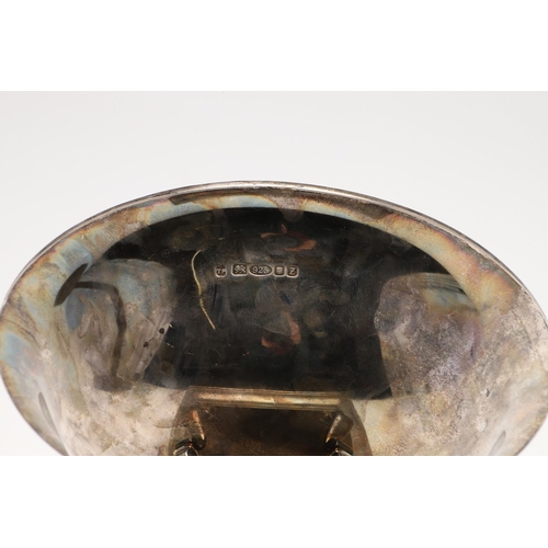122 - A MODERN SILVER FRUIT DISH ON STAND, BY THEO FENNELL. circular form, raised on a sloping square base... 