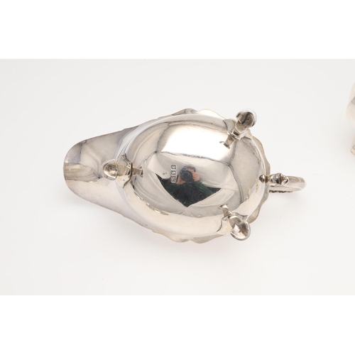 158 - A SMALL MIXED LOT OF SILVER. to include a pair of toast racks, an inkwell (loaded base), a sauce boa... 