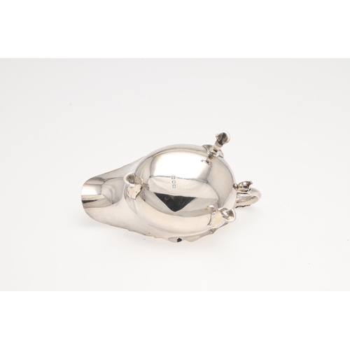 158 - A SMALL MIXED LOT OF SILVER. to include a pair of toast racks, an inkwell (loaded base), a sauce boa... 