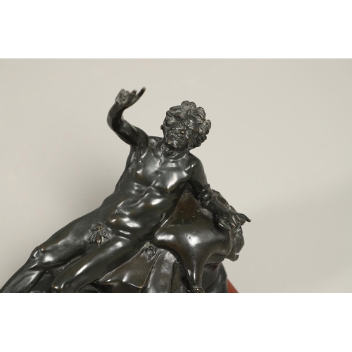 449 - AN ITALIAN BRONZE STUDY OF A BACCHANLIAN FIGURE. 19th century, modelled reclining upon a lion pelt w... 