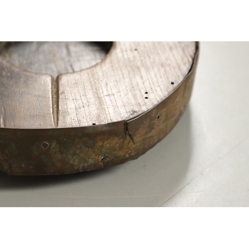 452 - A PAIR OF EARLY 19TH CENTURY BRASS BOUND OAK TAVERN COASTERS. of double gourd shape, on brass caster... 