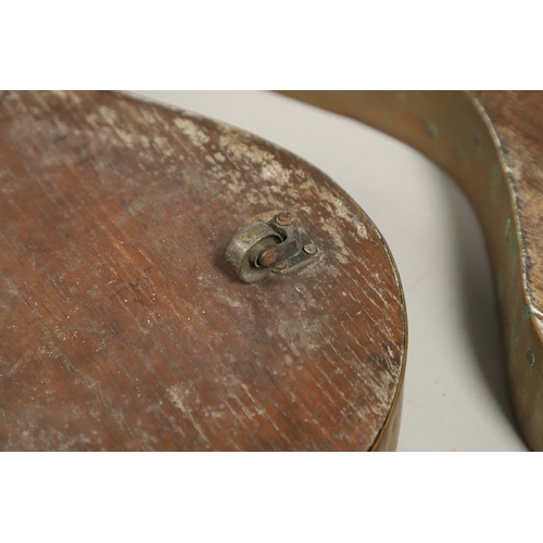 452 - A PAIR OF EARLY 19TH CENTURY BRASS BOUND OAK TAVERN COASTERS. of double gourd shape, on brass caster... 