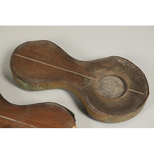 452 - A PAIR OF EARLY 19TH CENTURY BRASS BOUND OAK TAVERN COASTERS. of double gourd shape, on brass caster... 