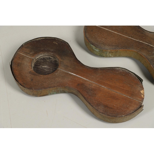 452 - A PAIR OF EARLY 19TH CENTURY BRASS BOUND OAK TAVERN COASTERS. of double gourd shape, on brass caster... 