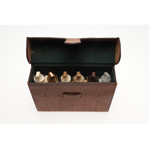 454 - AN EARLY 20TH CENTURY MEDICAL TRAVELLING SET. An interesting Doctors medical set, the leather cased ... 