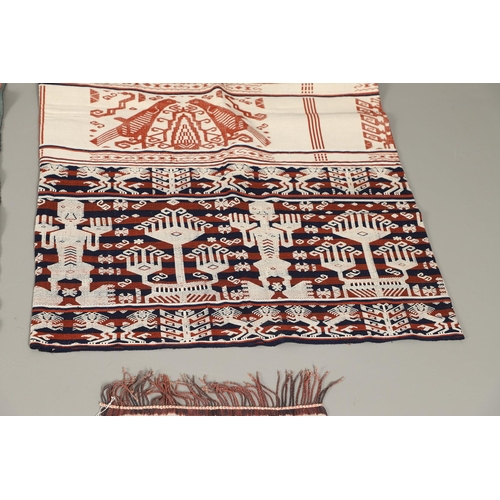 457 - FIVE INDONESIAN SUMBA IKAT COTTON TEXTILE PANELS. of varying size and design, the longest 52cm x 60c... 