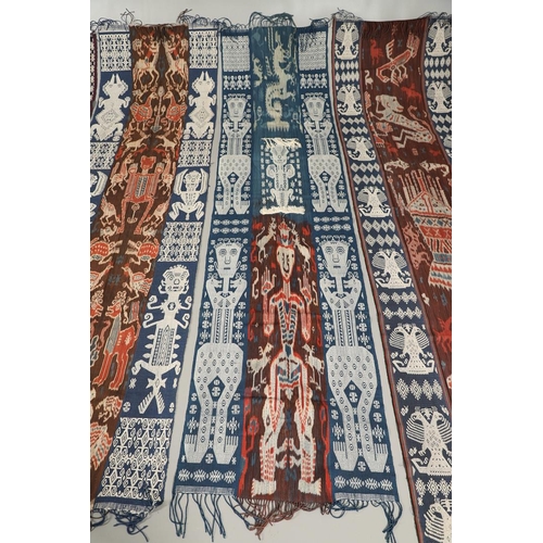 458 - FIVE INDONESIAN SUMBA IKAT COTTON TEXTILE PANELS. of varying size and design, the longest 243cm x 66... 