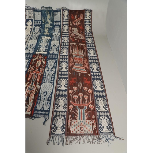 458 - FIVE INDONESIAN SUMBA IKAT COTTON TEXTILE PANELS. of varying size and design, the longest 243cm x 66... 