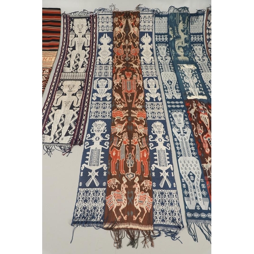 458 - FIVE INDONESIAN SUMBA IKAT COTTON TEXTILE PANELS. of varying size and design, the longest 243cm x 66... 