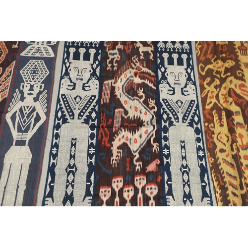 460 - FOUR INDONESIAN SUMBA IKAT COTTON TEXTILE PANELS. of varying sizes and figural designs, the longest ... 