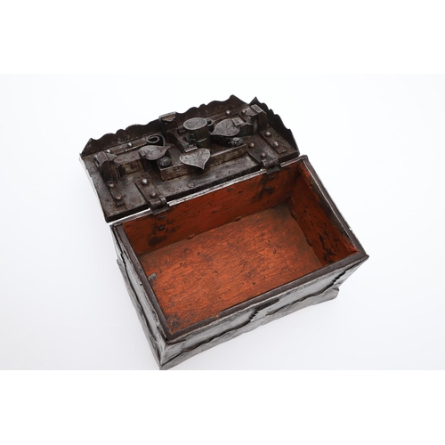 463 - A GERMAN MINIATURE IRON STRONG BOX. possibly late 19th century, with carrying handle and key, height... 