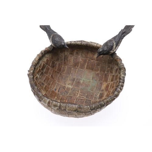 465 - AN EARLY 20TH CENTURY VIENNESE COLD PAINTED BRONZE. modelled as a circular basket with two magpies p... 